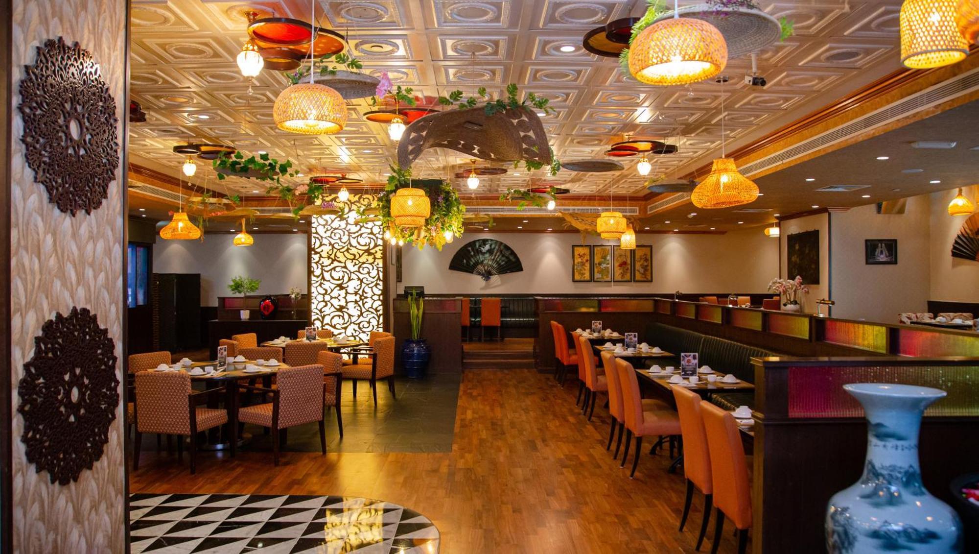 Park Regis Kris Kin Hotel Дубай Екстериор снимка Interior of a restaurant in Hong Kong