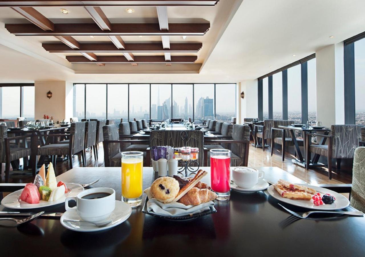 Park Regis Kris Kin Hotel Дубай Екстериор снимка The Club at Haneda Airport